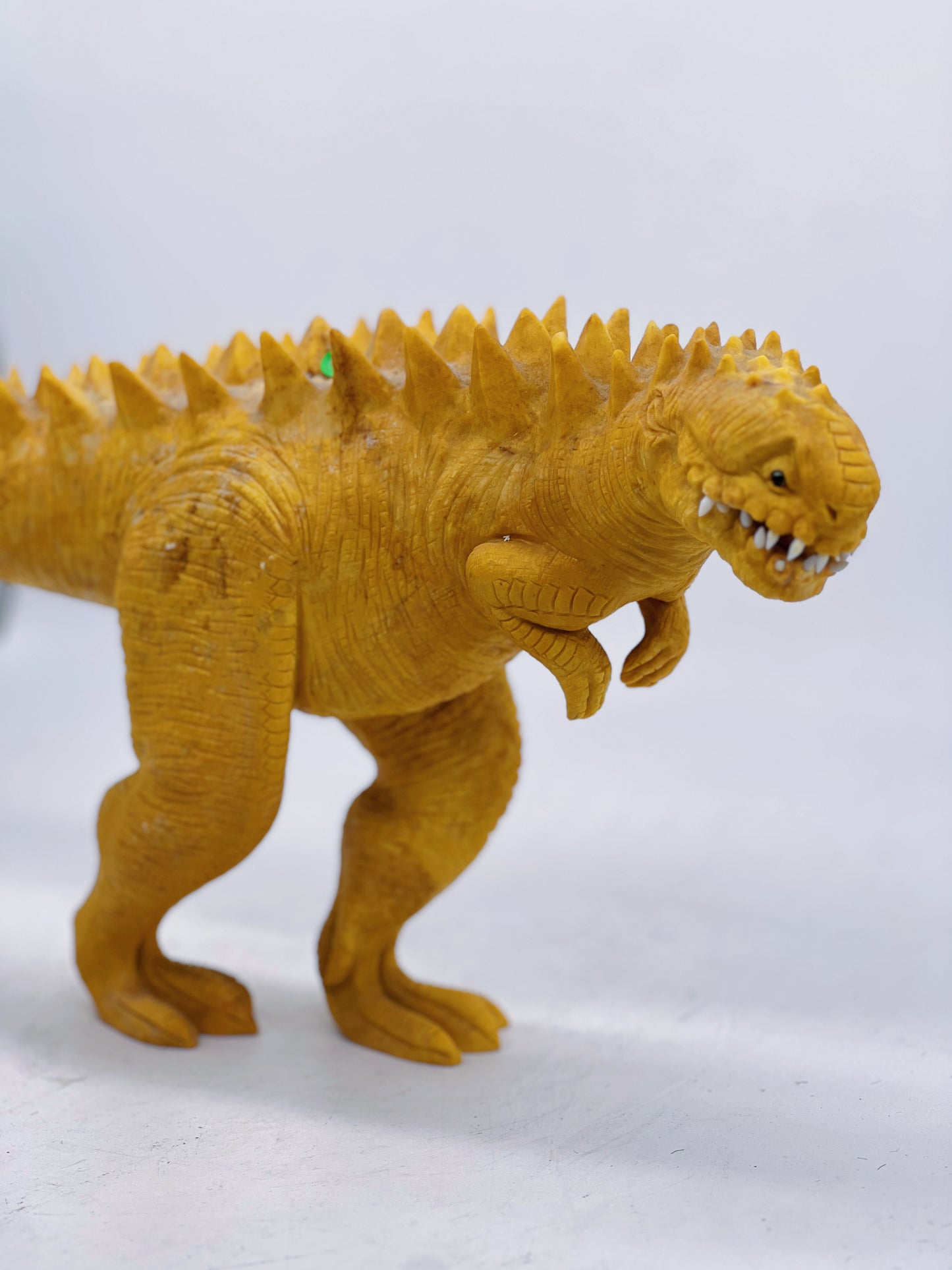 Yellow Jade T-rex Carving